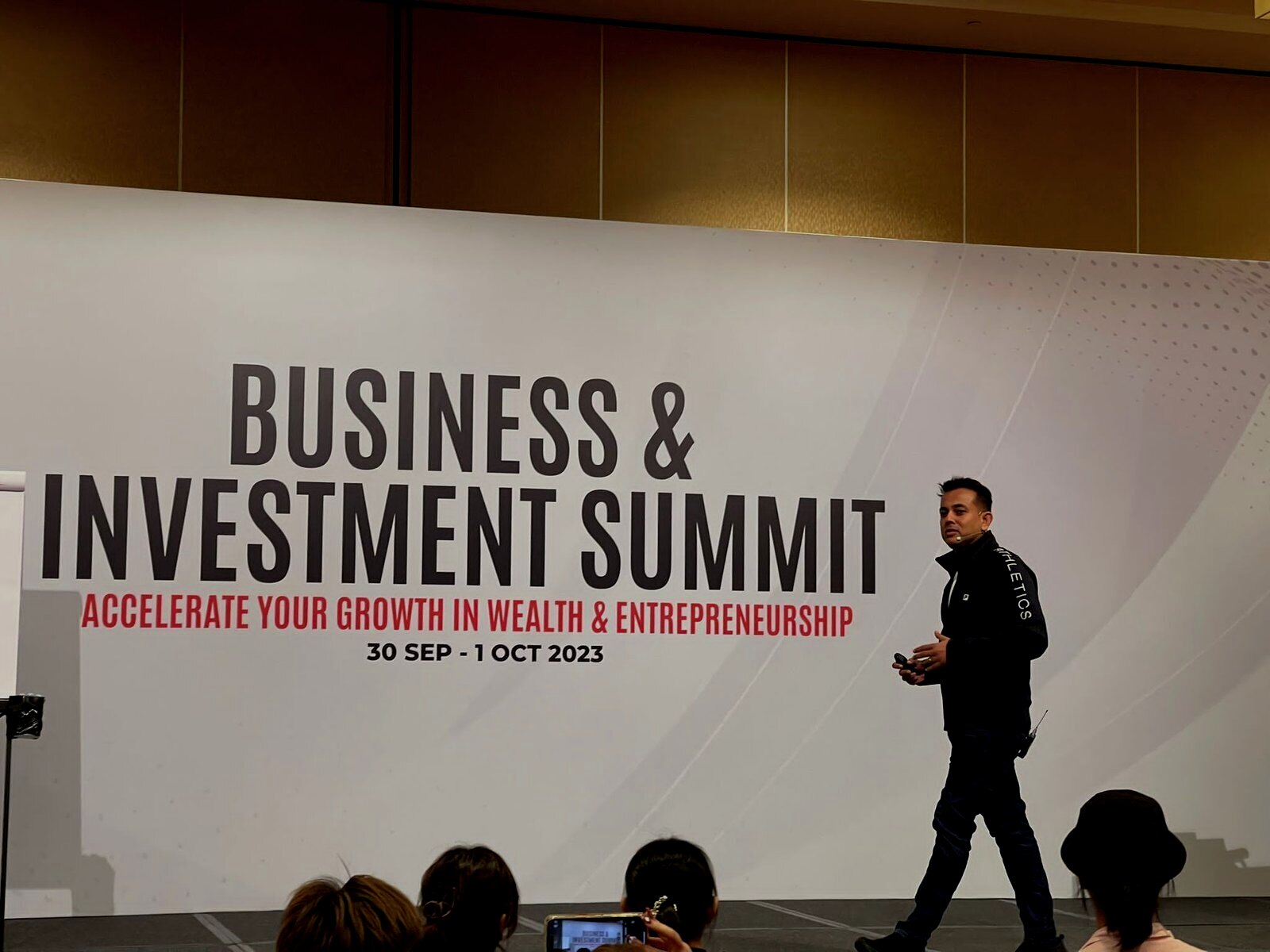 Kishor M speaking at the Business and Investment Summit